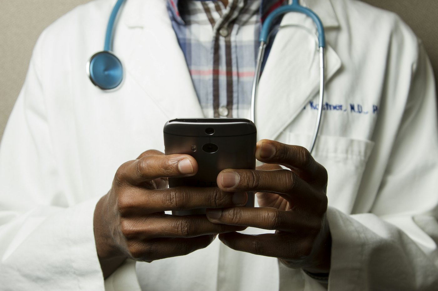 A doctor using a smartphone